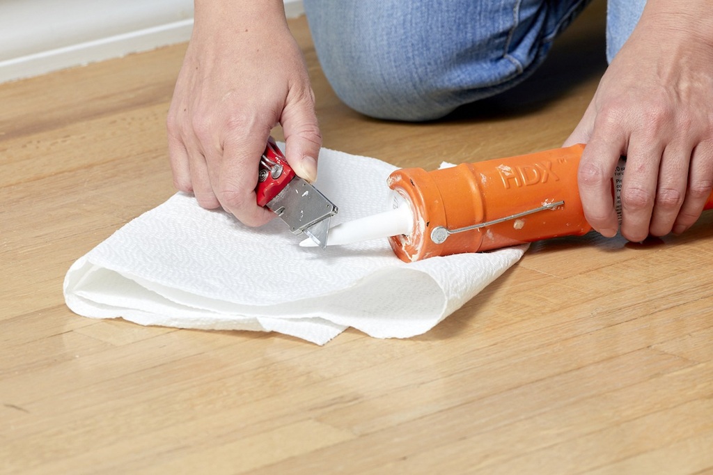 Can you use a hair dryer to speed up caulk drying