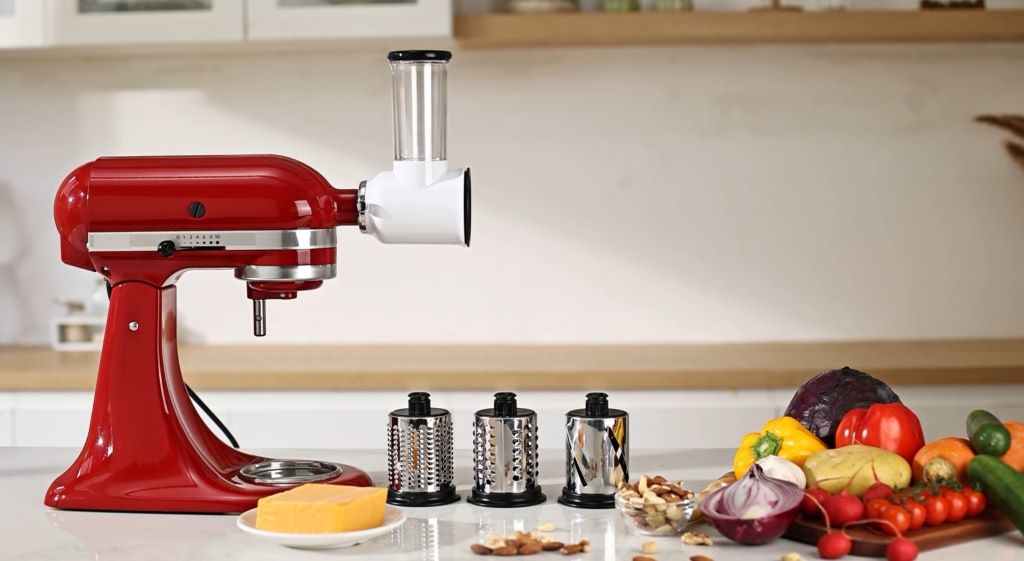 Close-up of slicer shredder attachment creating even slices and shreds for cooking.